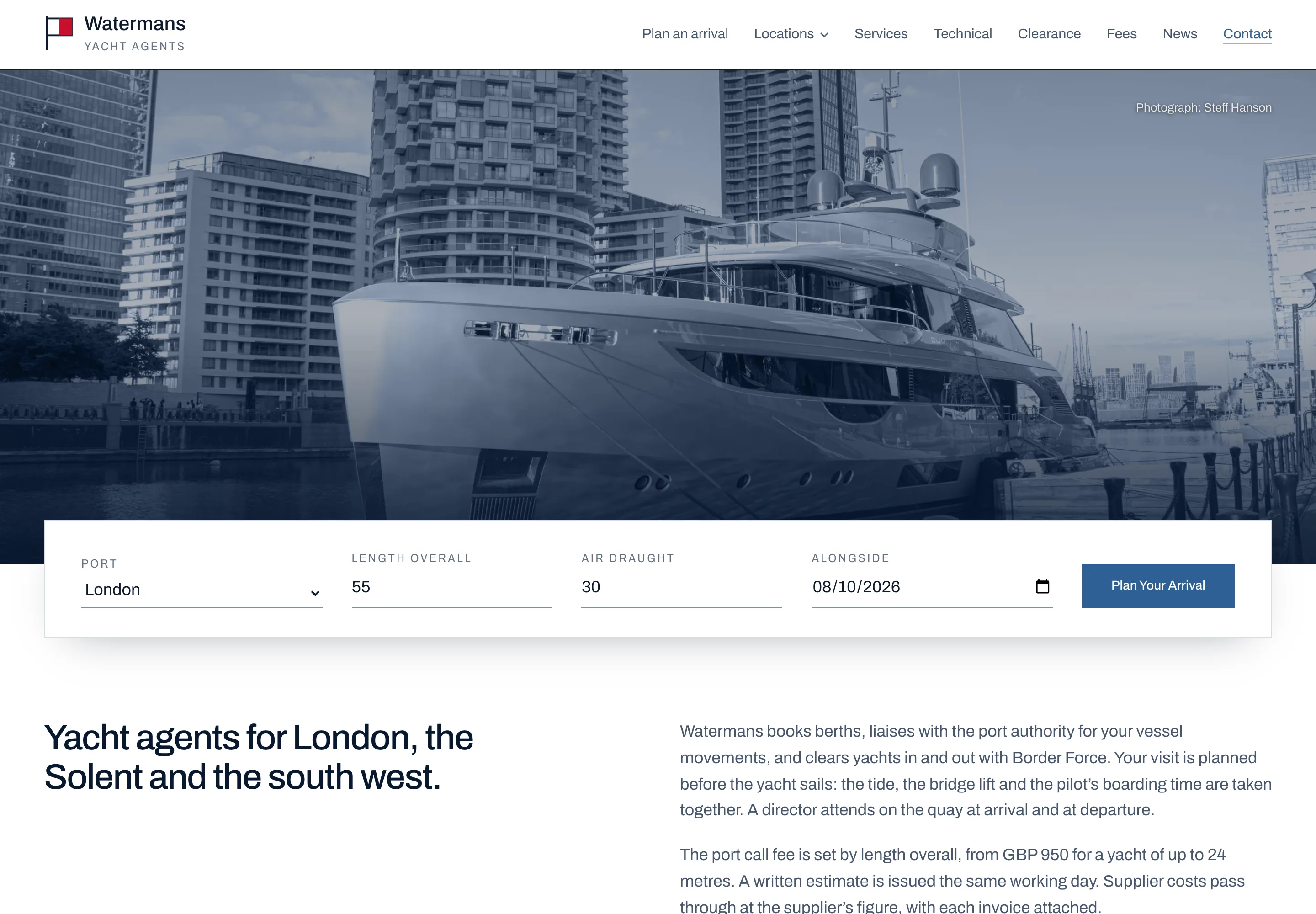 The Watermans homepage, a yacht alongside at West India Dock in navy duotone with the arrival bar beneath